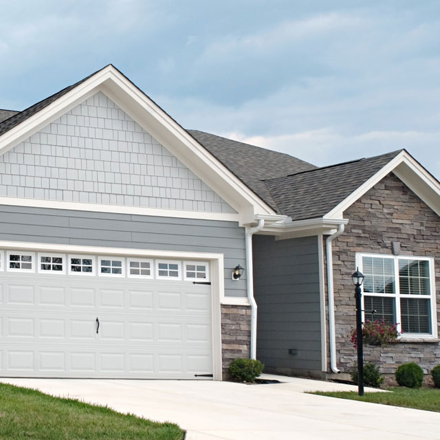 House With Garage And Shake Siding Sq