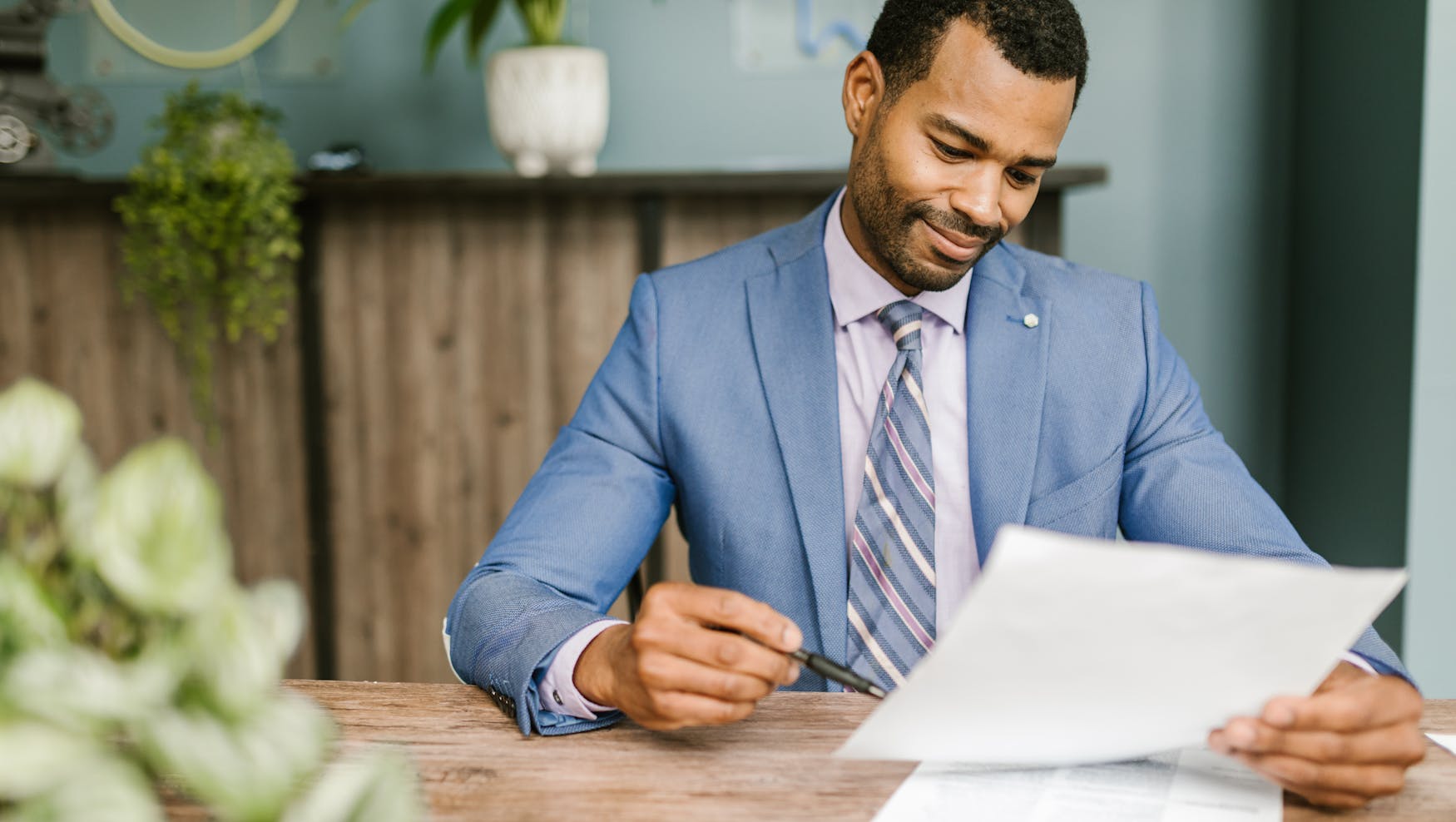 Man Reviewing A Contract